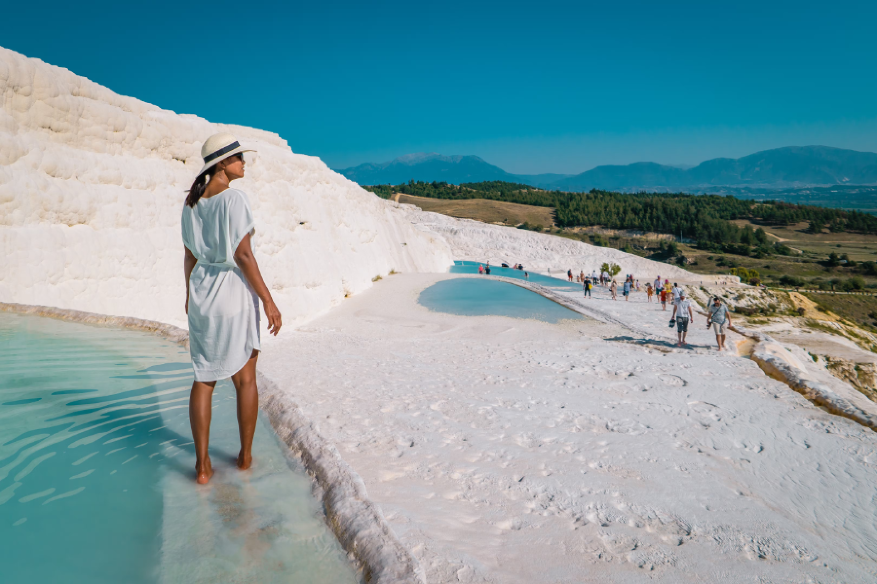 A traveller walking on the Pamukkale travertines